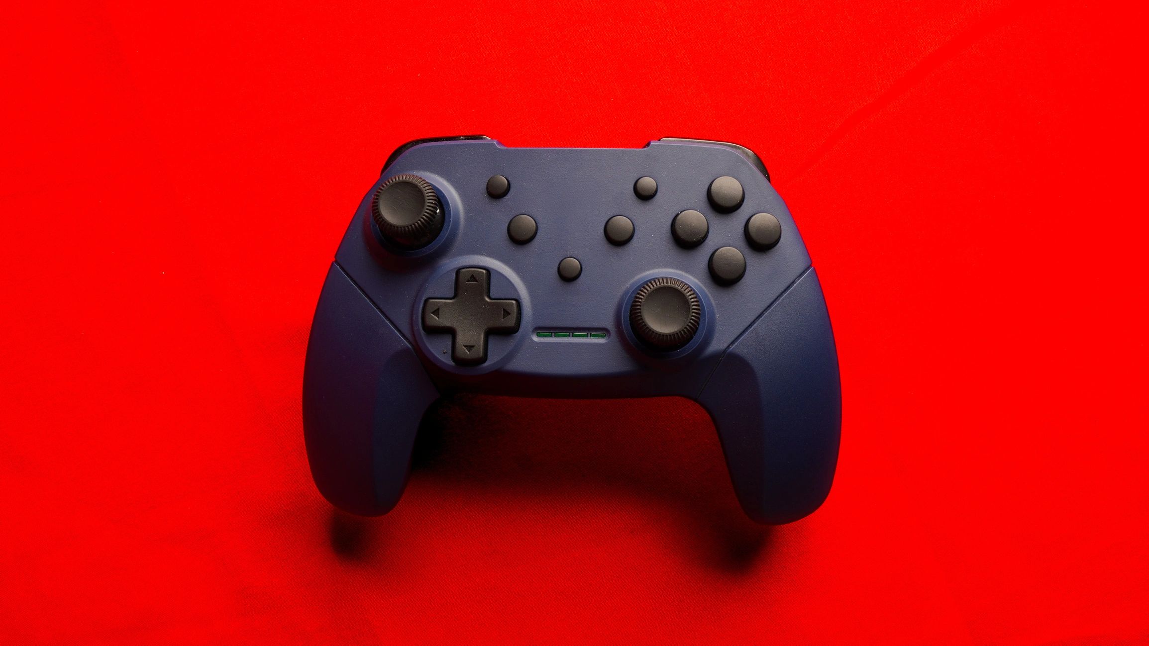 Joystick on red background