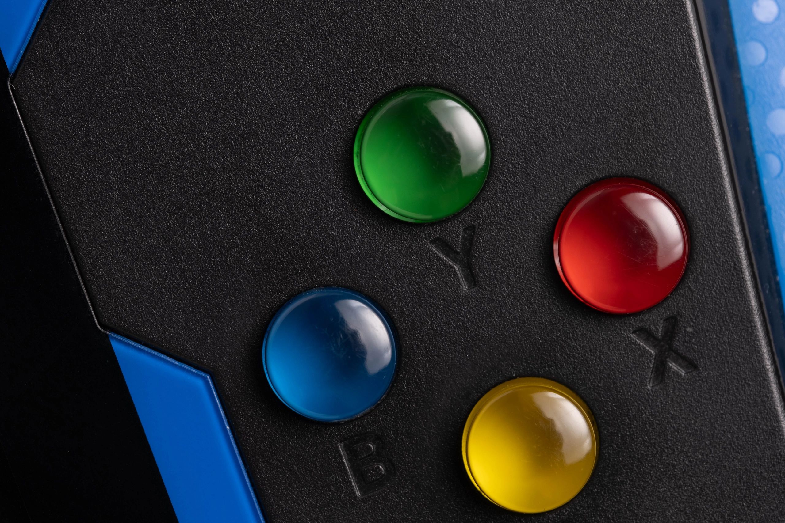 Close-up of a colorful video game controller